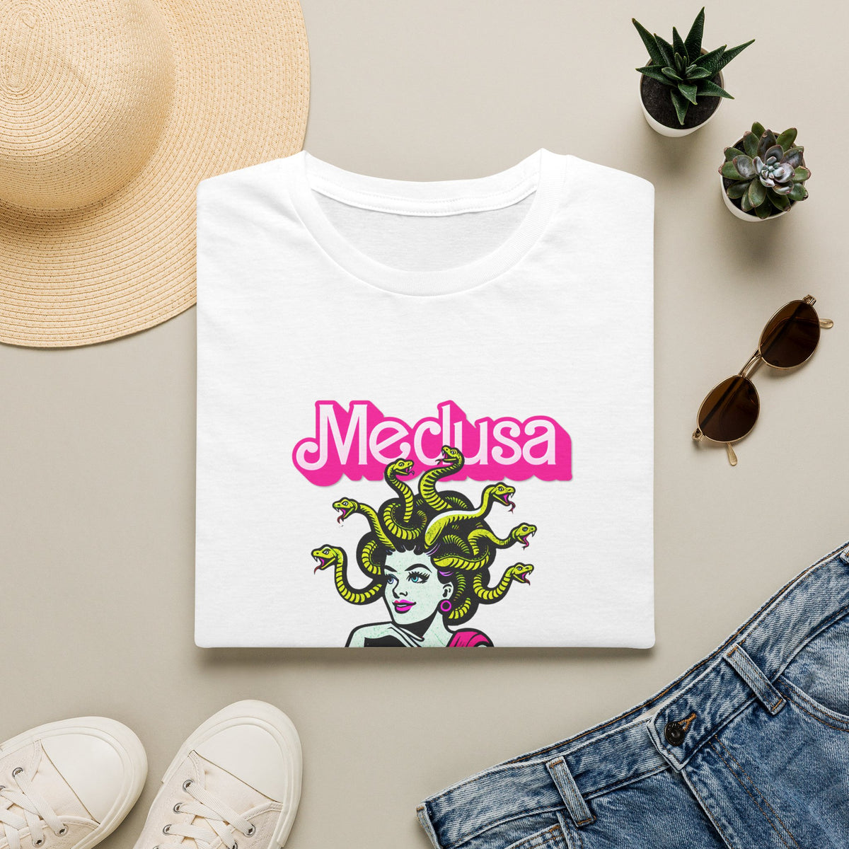 Medusa Graphic T-Shirt — Retro Pink Logo Snake-Head Illustration