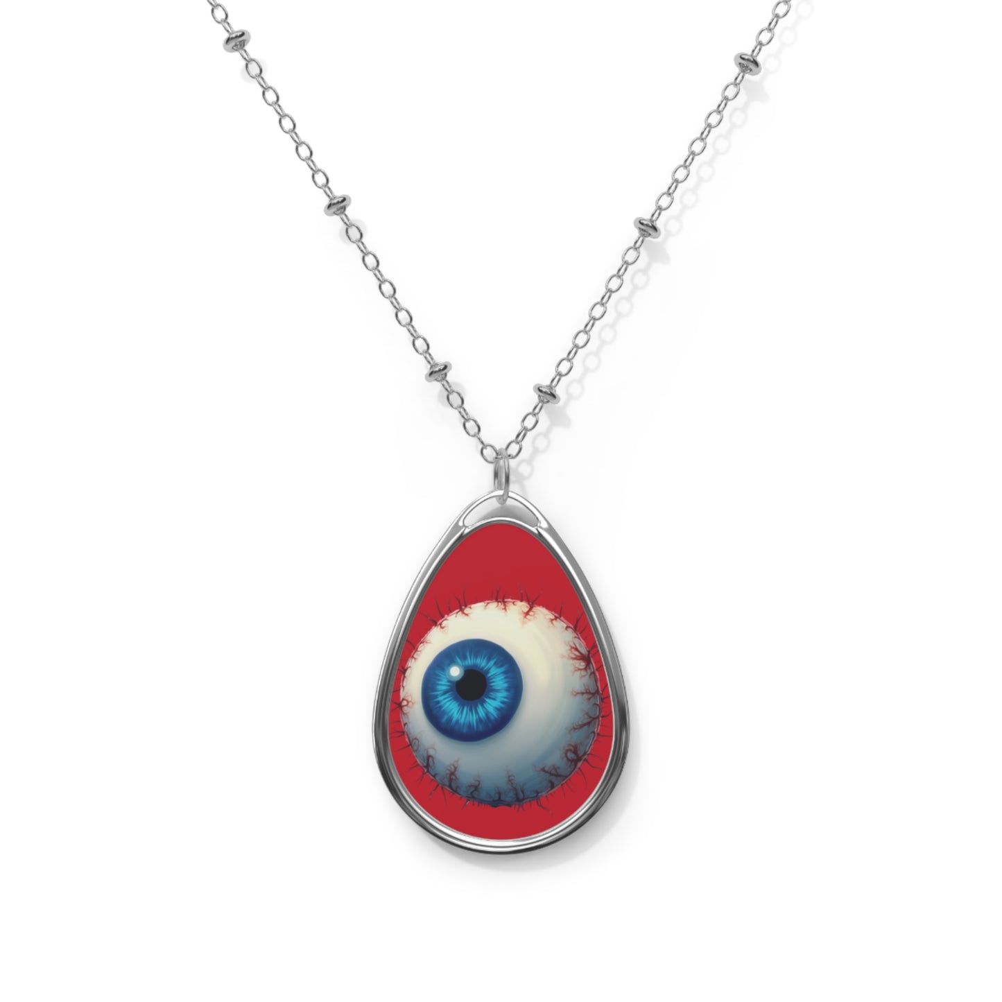 Evil Eye Teardrop Necklace — Blue Eye Oval Pendant on Red Background